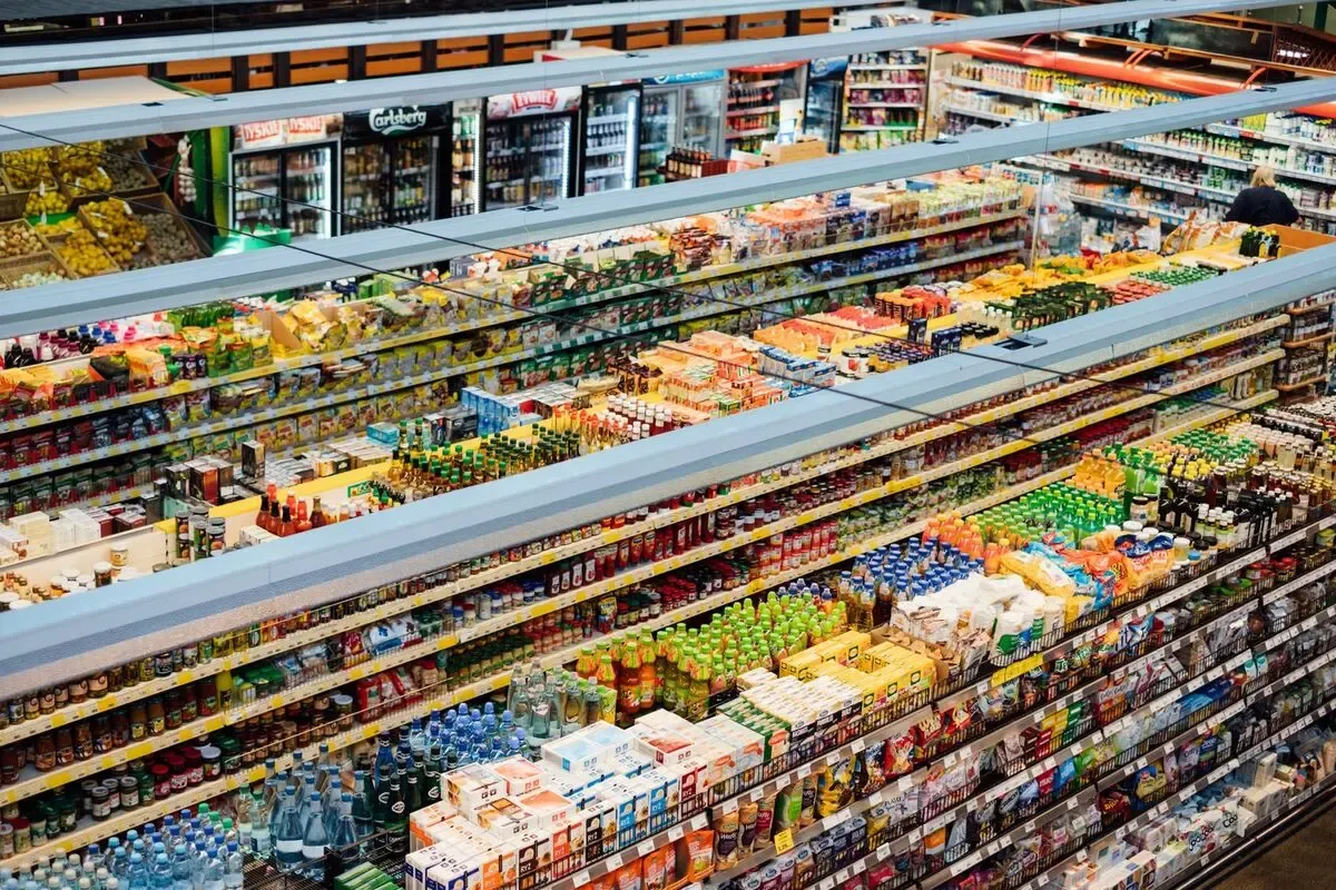 Stocked supermarket aisles of the kind counted on a retail stocktake.