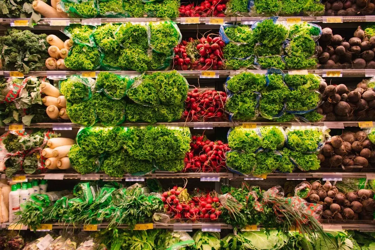 Retail produce shelves of the kind valued when a shop is bought or sold.