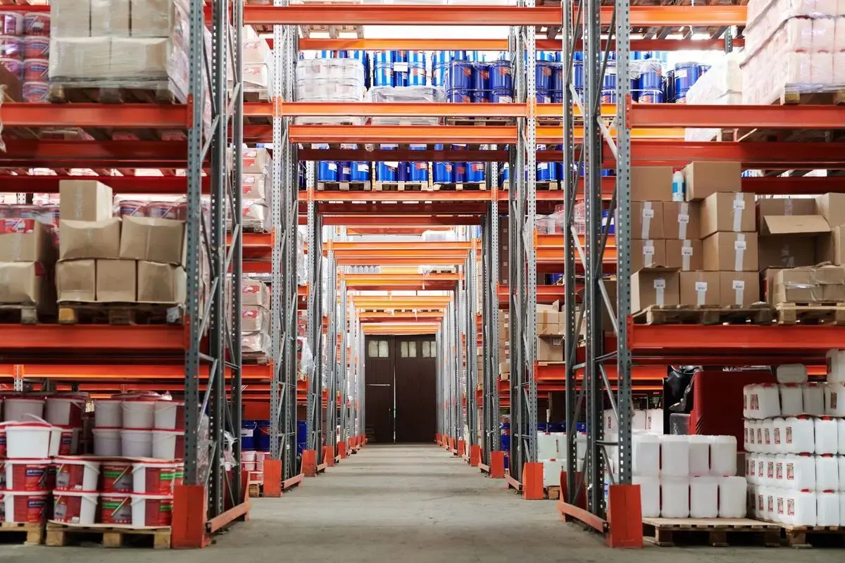 Warehouse racks of boxed stock of the kind counted on a planned or year-end stocktake.